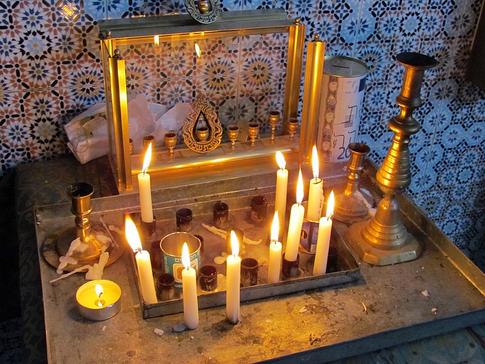 Historic Moroccan synagogue interior with arches